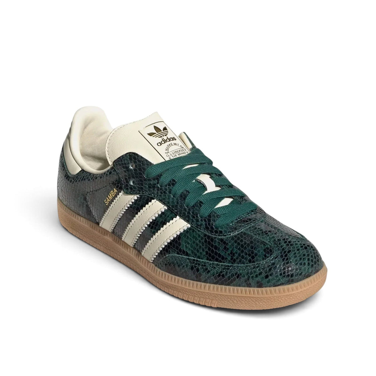 Bliss sneakers marka, yılan derisi desenli orman yeşili deri yüzeye ve krem rengi detaylara sahip adidas Samba ayakkabı