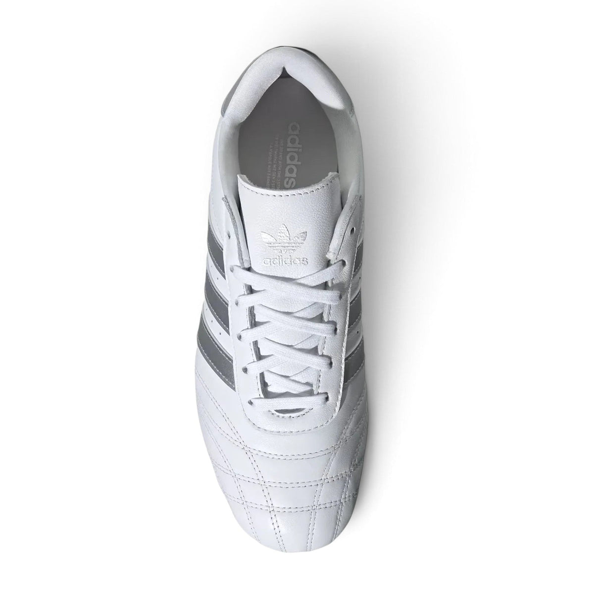Bliss sneakers beyaz sentetik deri adidas Originals spor ayakkabı, gümüş detaylı ve dikişli ön tasarıma sahip.