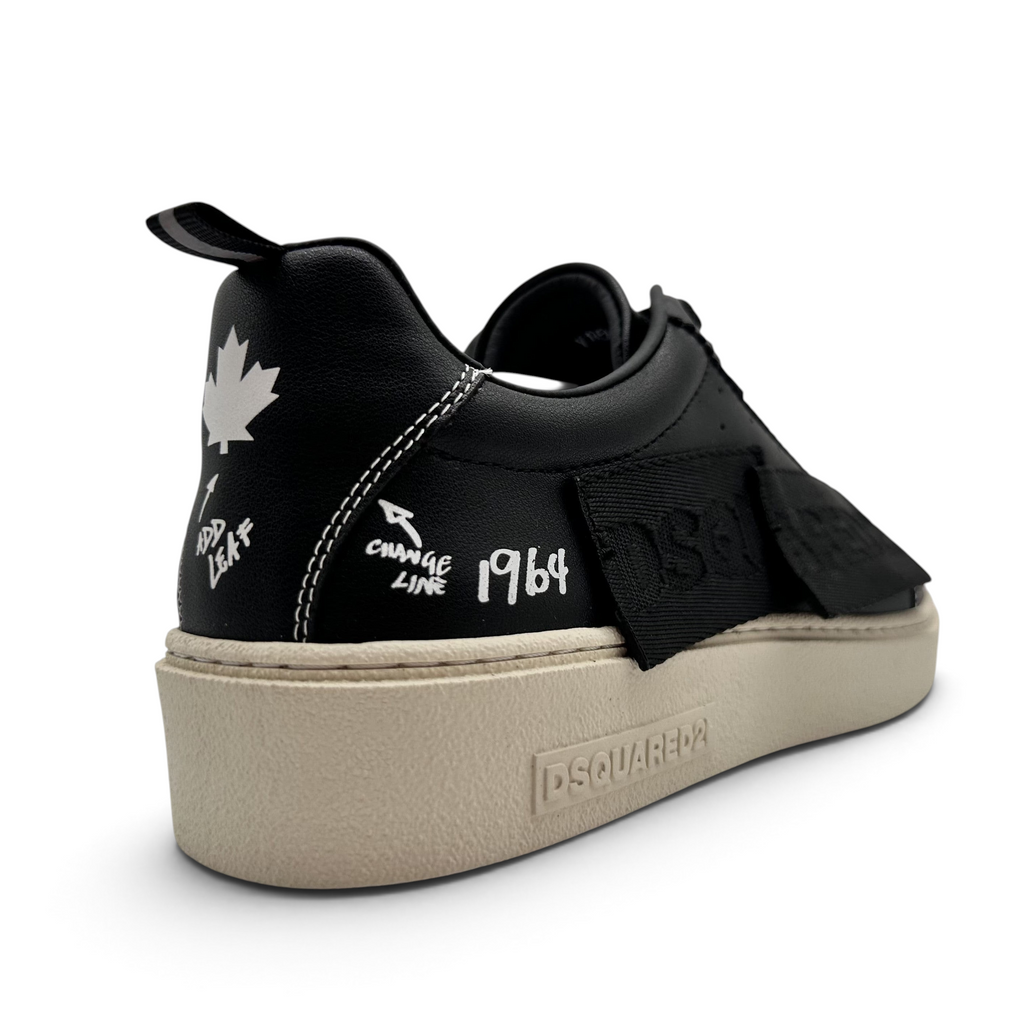 Bliss sneakers DSQUARED2 siyah deri sneaker, beyaz grafik baskılı, yaprak figürlü ve krem rengi kalın tabanlı tasarım