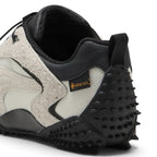 Bliss sneakers krem ve siyah renkli, süet ve tekstil detaylı, Gore-Tex teknolojili çivili taban spor ayakkabı
