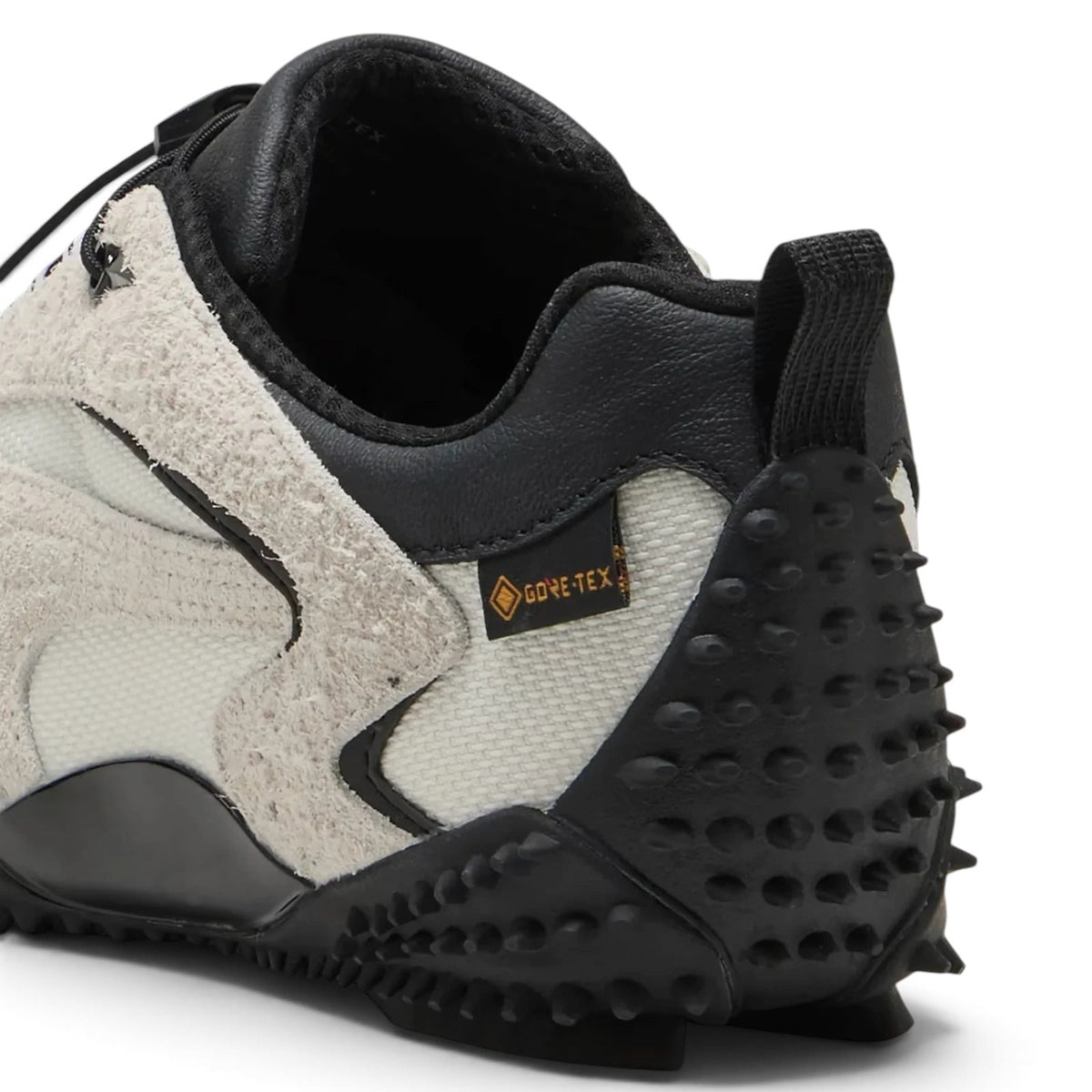 Bliss sneakers krem ve siyah renkli, süet ve tekstil detaylı, Gore-Tex teknolojili çivili taban spor ayakkabı