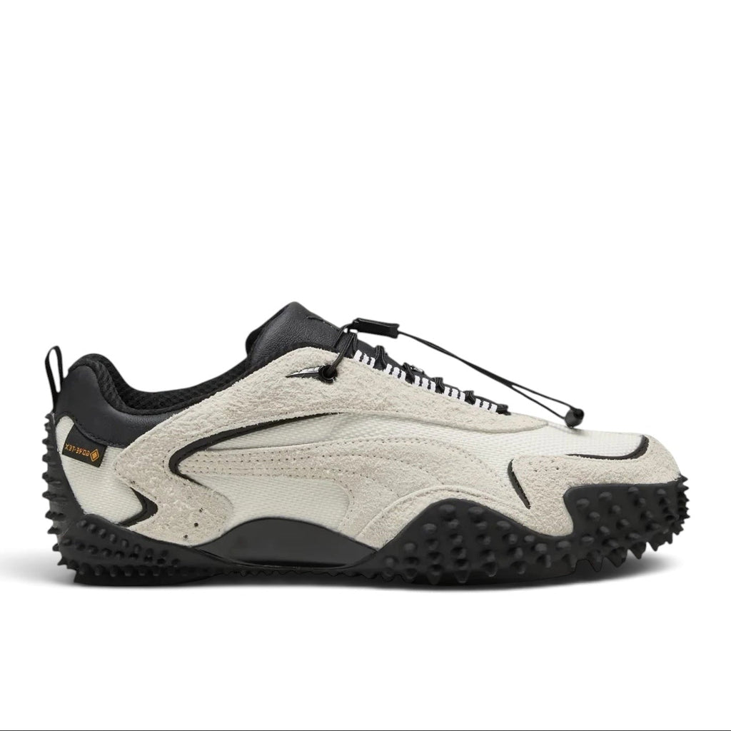 Bliss sneakers krem ve siyah renkli, süet detaylı, çivili tabanlı Gore-Tex teknolojili modern spor ayakkabı