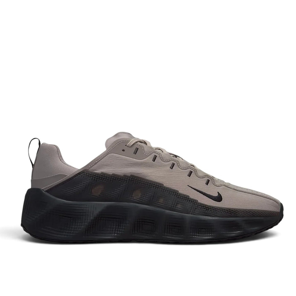 Bliss sneakers Nike gri ve siyah renkli, modern tasarımlı, nefes alabilen günlük spor ayakkabı