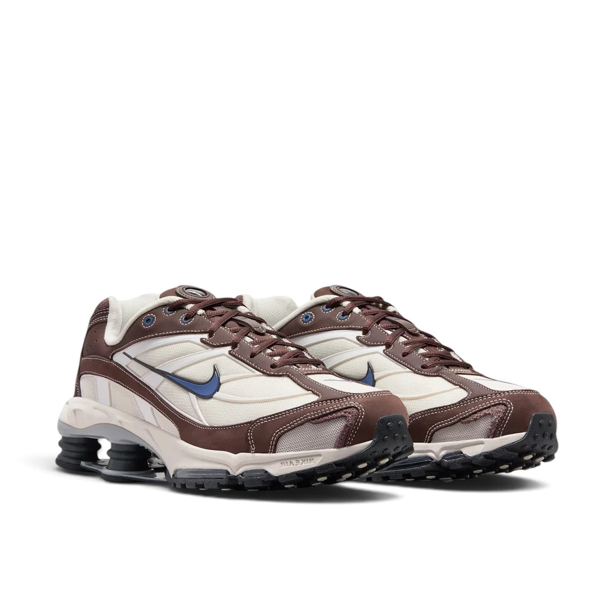 Bliss sneakers Nike Shox TL kahverengi ve krem tonlarında, mavi detaylı, mekanik yastıklamalı günlük spor ayakkabı