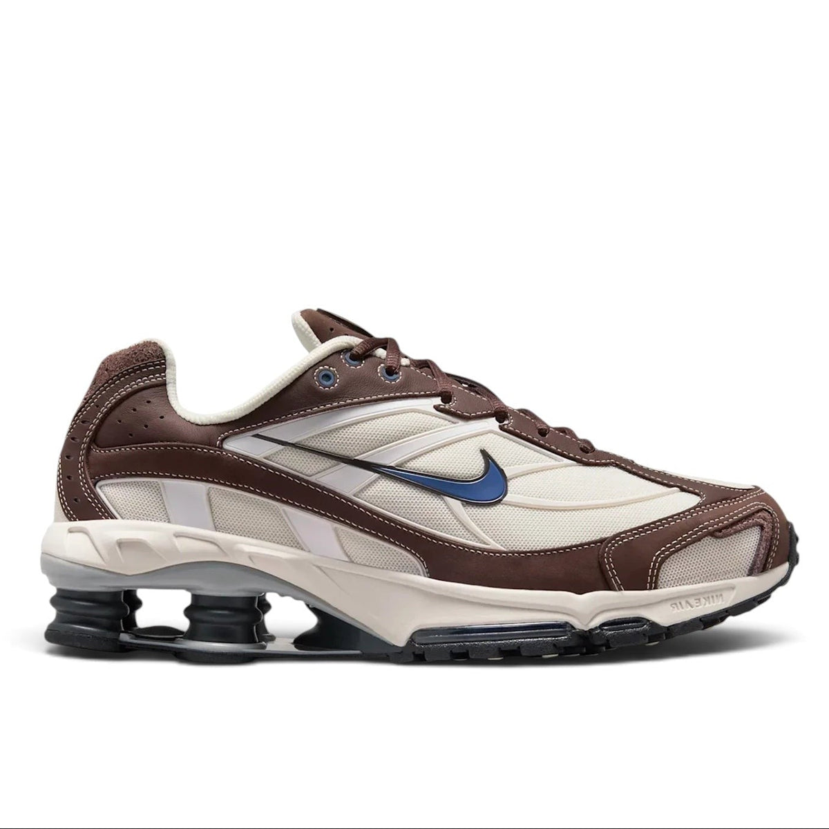 Bliss sneakers Nike Shox TL kahverengi ve krem renkli, mavi detaylı, mekanik yastıklamalı modern spor ayakkabı.