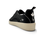 Bliss sneakers siyah deri erkek spor ayakkabı, beyaz dikiş detayları, topukta yaprak figürü ve krem rengi taban.
