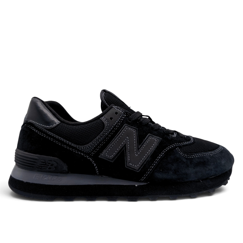 New Balance 574 all-black sneakers